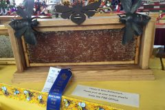 Doug Clemens won first prize for his frame of honey.